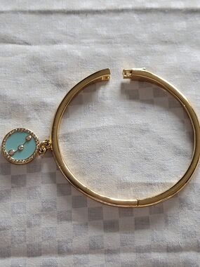 Kate Spade NY Gold Tone Hinged Bangle Bracelet with Turquoise Enamel AIRES Charm